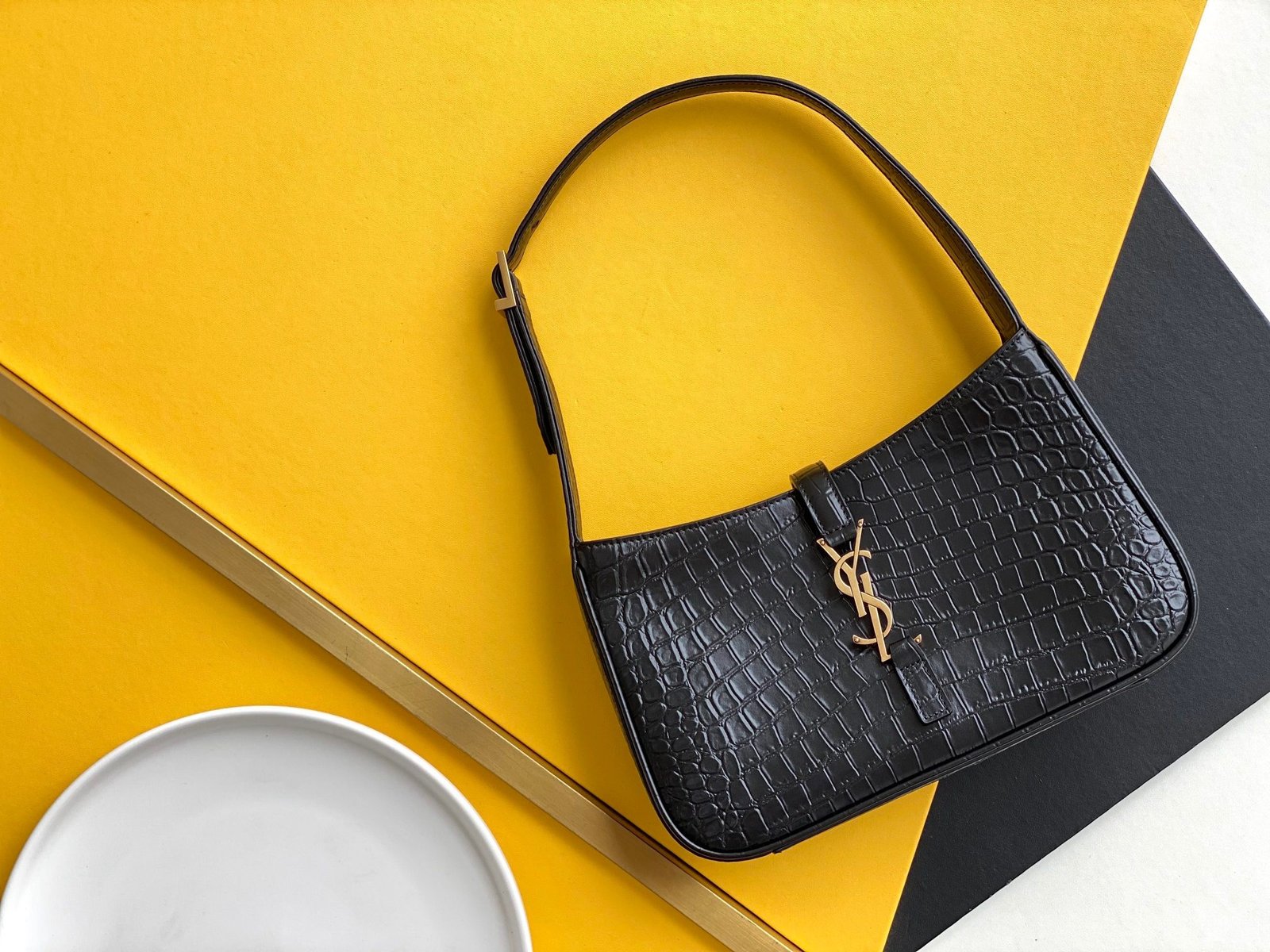 Saint Laurent Le 5 à 7 hobo bag in crocodile-embossed shiny leather.