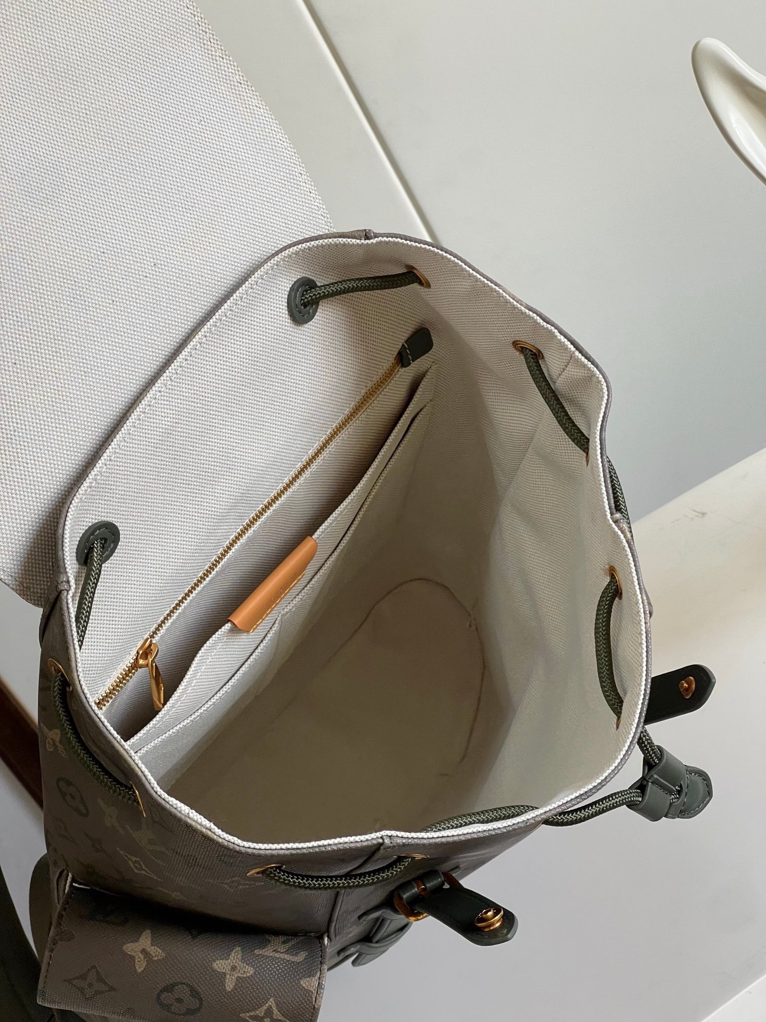 Louis Vuitton Christopher MM backpack in green Monogram Surplus coated canvas with aged gold-color hardware - Image 8