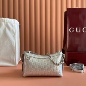 Gucci Small GG Emblem Embossed Shoulder Bag in Silver